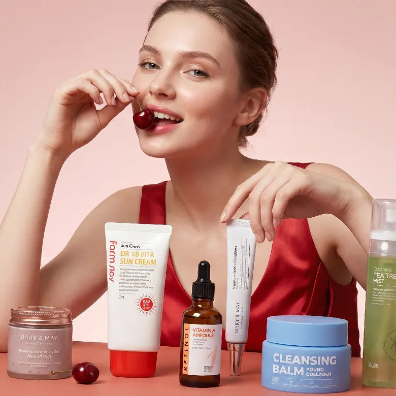 Woman with skincare products on a pink background with text about glow and confidence.